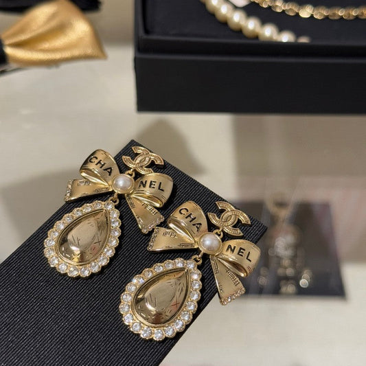 18K CC 25K Golden Bow Earrings