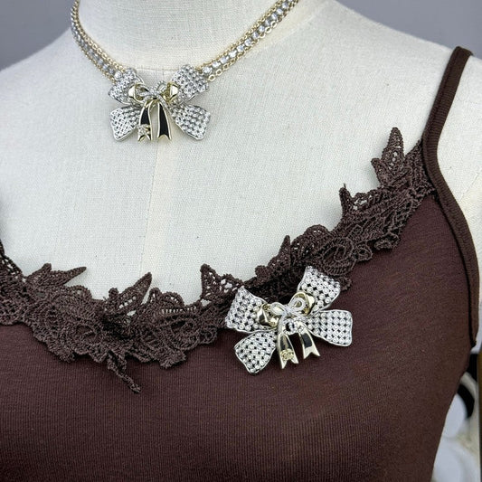 18K CC 25K Bow Tie Diamond Brooch