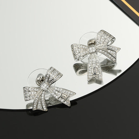 18K CC Bow Tie Diamond Earrings