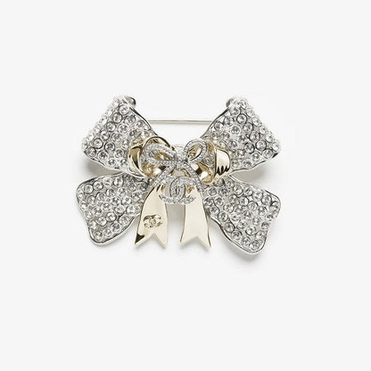 18K CC 25K Bow Tie Diamond Brooch