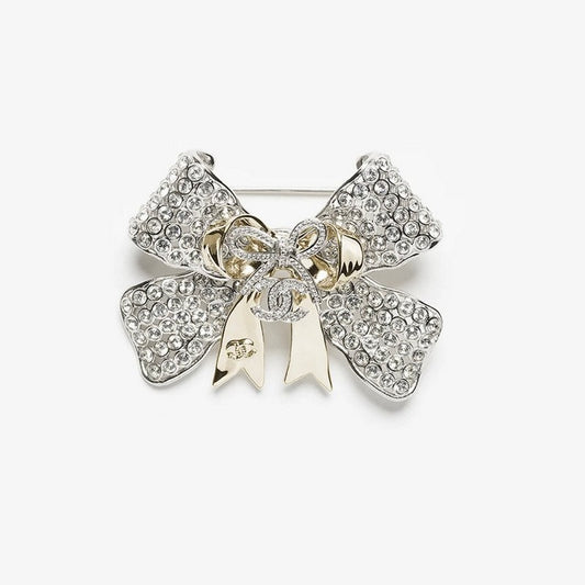18K CC 25K Bow Tie Diamond Brooch