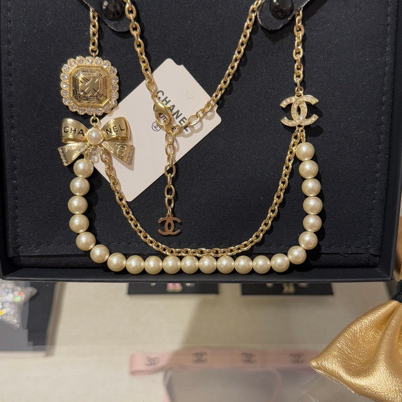 18K CC 25K Butterfly Pearl Necklace