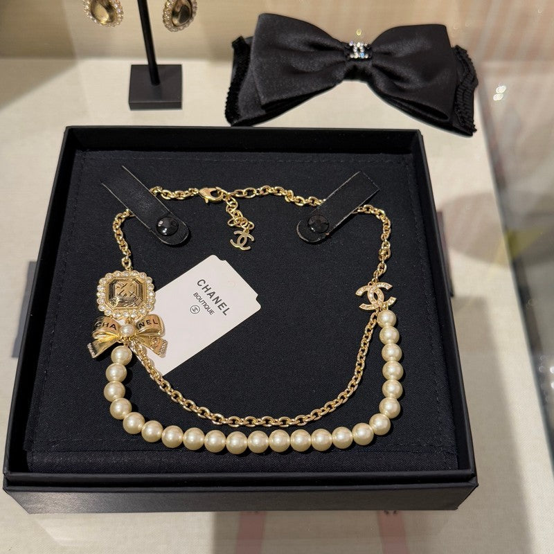 18K CC 25K Butterfly Pearl Necklace