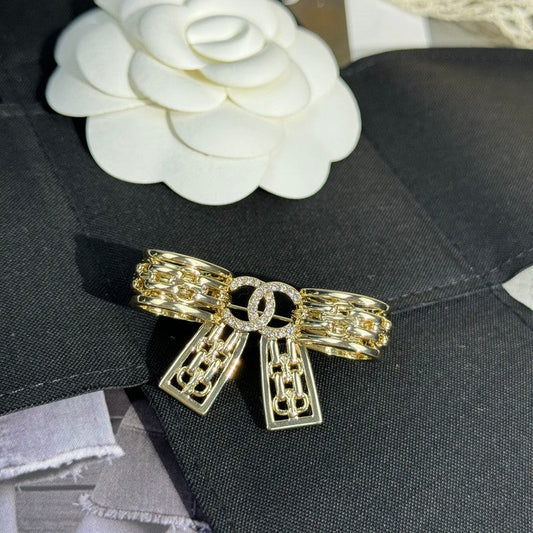 18K CC 25K Bow Tie Diamond Gold Brooch
