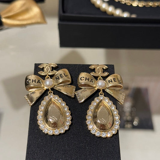 18K CC 25K Golden Bow Earrings