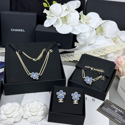 18K CC 26C Blue Flower Diamond Earrings