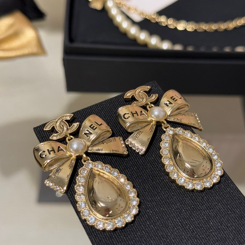 18K CC 25K Golden Bow Earrings