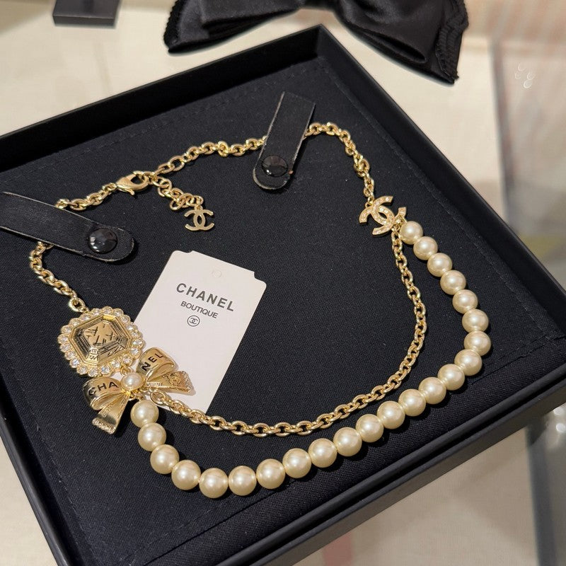 18K CC 25K Butterfly Pearl Necklace