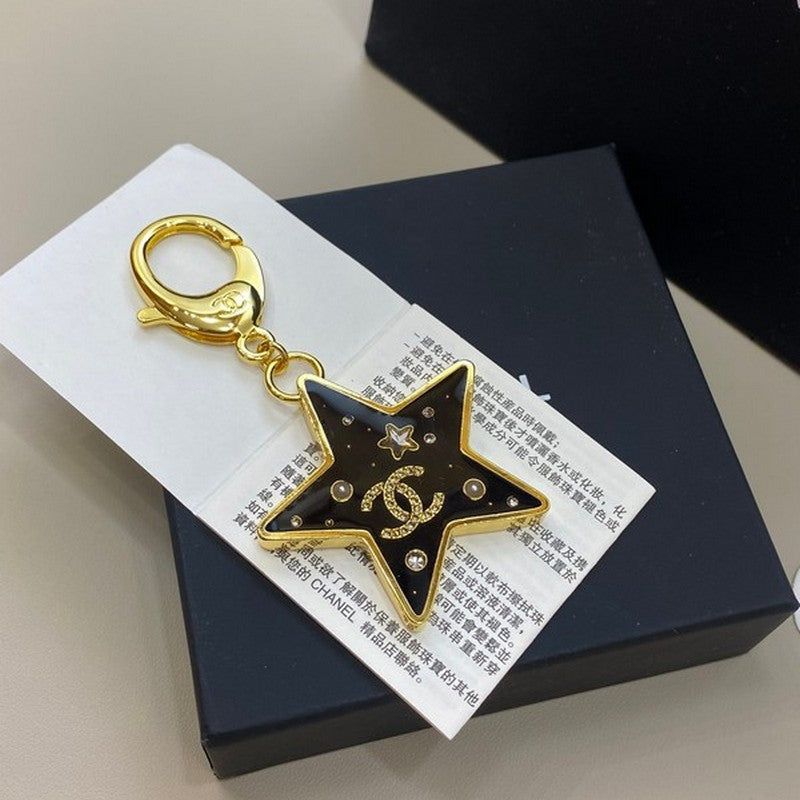 18K CC Black Gold Star Brooch