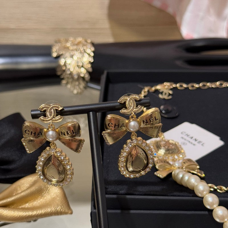 18K CC 25K Golden Bow Earrings