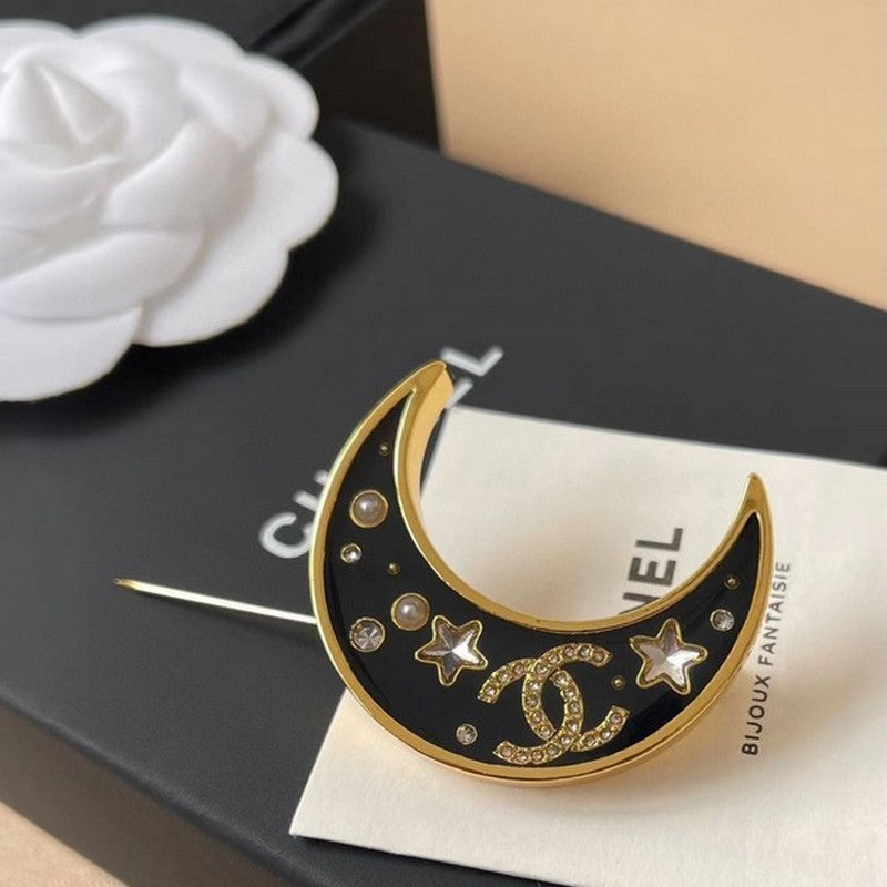 18K CC 25K Black Moon Brooch