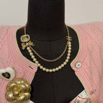 18K CC 25K Butterfly Pearl Necklace