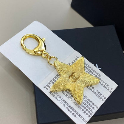 18K CC Black Gold Star Brooch