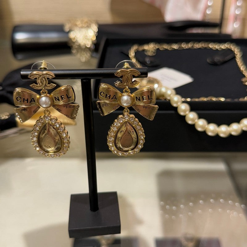 18K CC 25K Golden Bow Earrings