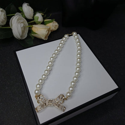 18K CC Bow Pearl Necklace