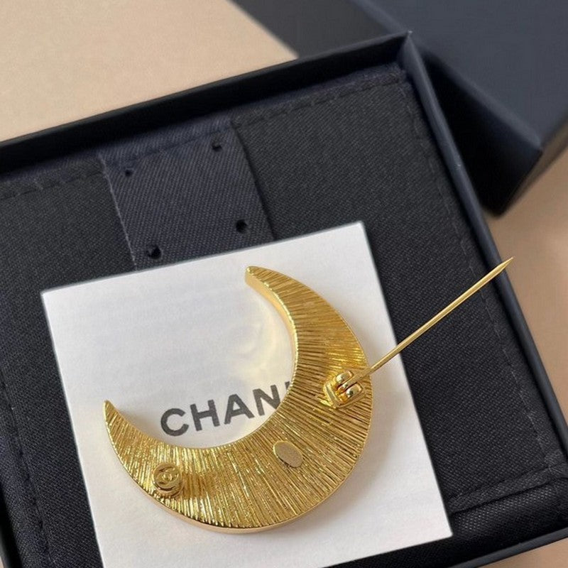 18K CC 25K Black Moon Brooch