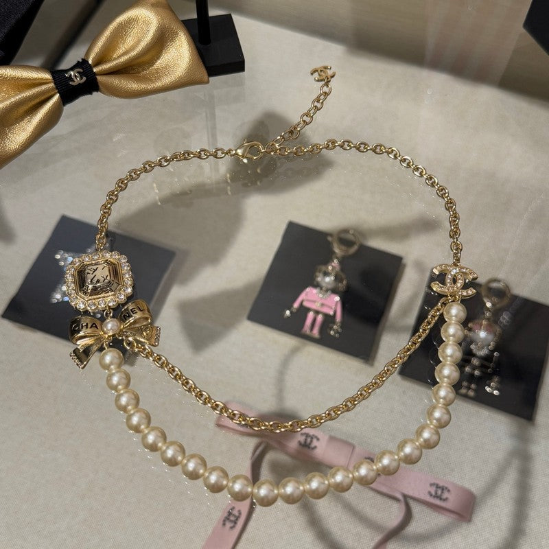 18K CC 25K Butterfly Pearl Necklace