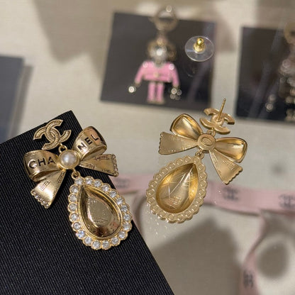 18K CC 25K Golden Bow Earrings