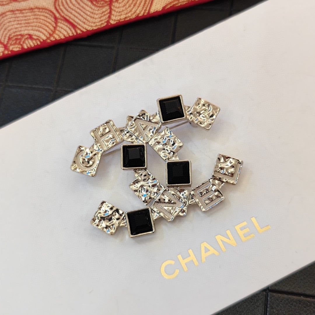 18K CC Black Crystals Brooch