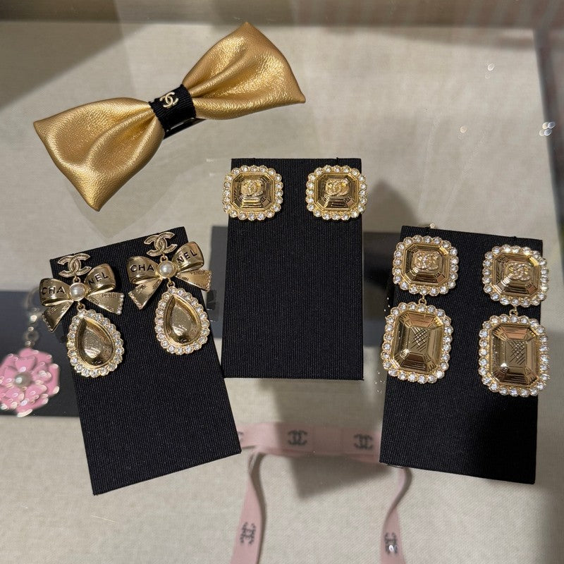 18K CC 25K Golden Bow Earrings